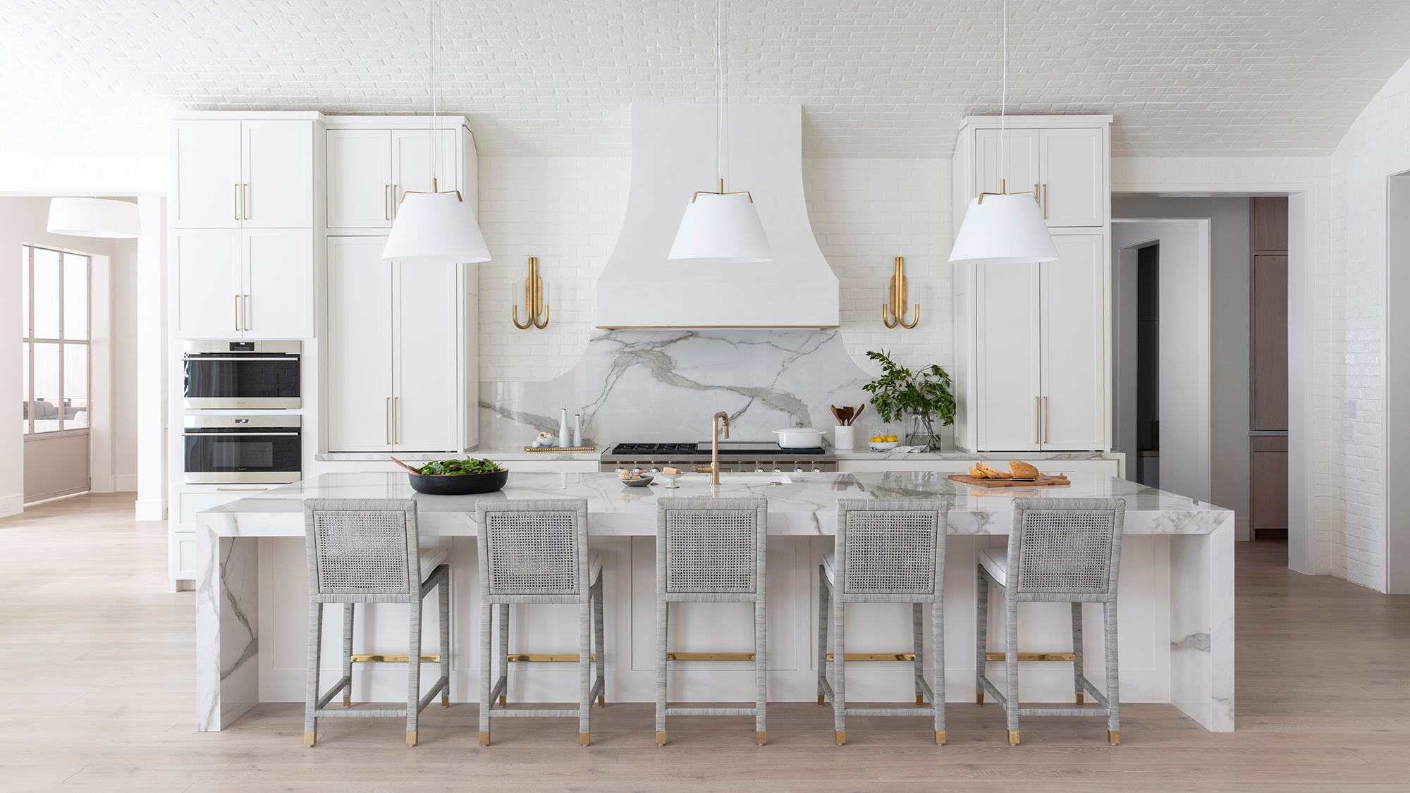 Residential interior where layered architectural and decorative lighting shapes the room