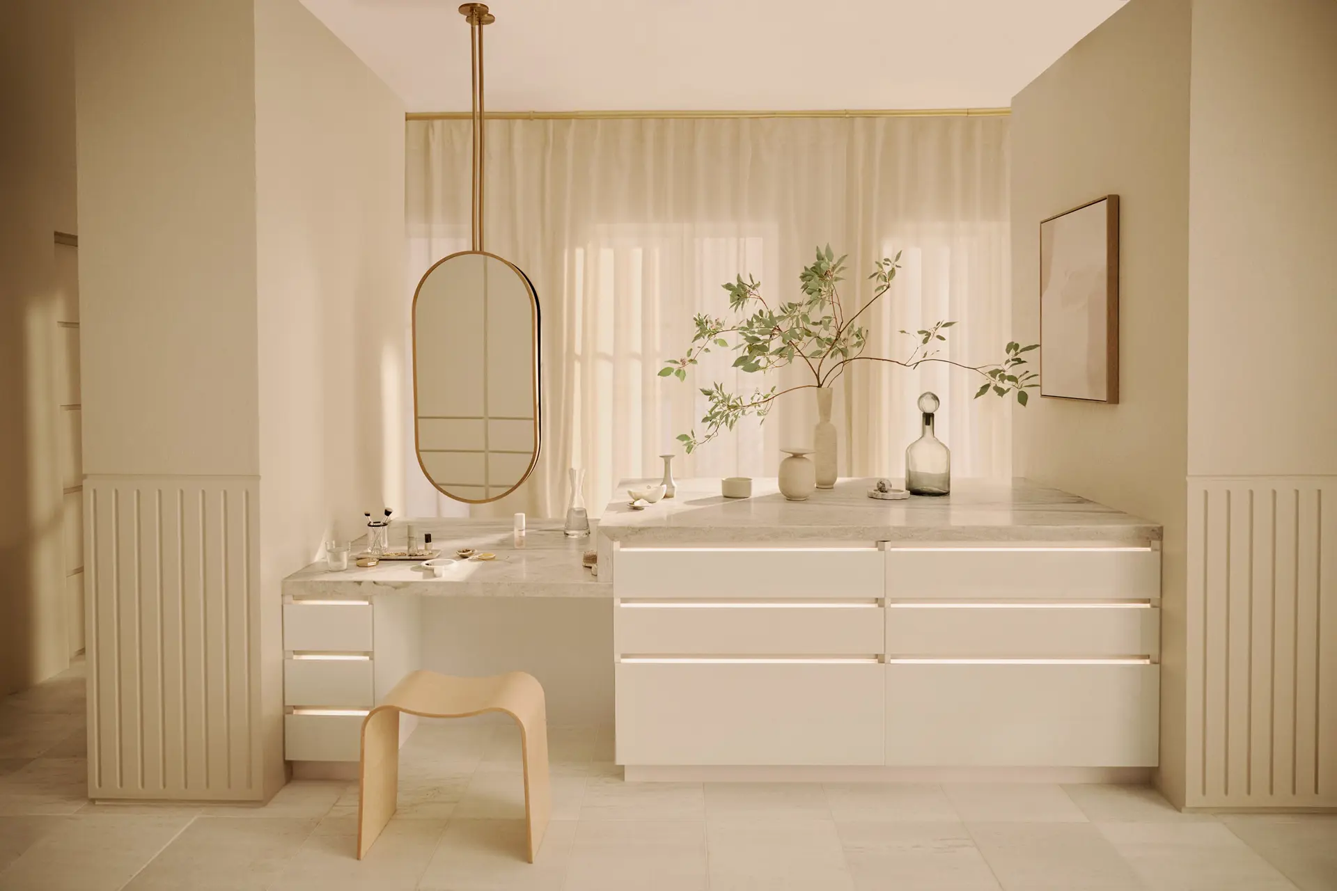Minimal double-sided vanity closet with marble surfaces, brass fixtures and soft natural light